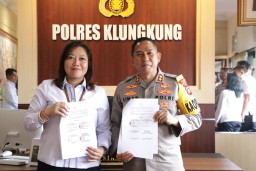 Kapolres Klungkung Dengan Ketua Pengadilan Negeri Semarapura Kelas II Tanda Tangani Mou Aplikasi E-Berpadu