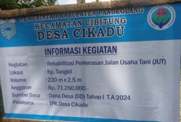 Pemdes Cikadu Realisasikan Anggaran Dana Desa Tahap I Tahun 2024 Perkerasan Jalan Usaha Tani Jut