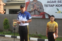 Polres Bandara Ngurah Rai Laksanakan Upacara Pengukuhan Komite Olah Raga Polri