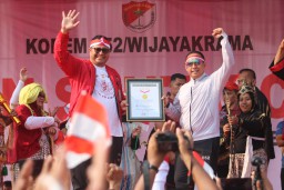 Semarak Jalan Santai Ceria Bersama Korem 052/Wkr Pecahkan Rekor Muri