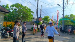 Bhabinkamtibmas Polsek Nusa Penida Desa Jungutbatu Laksanakan Pengamanan Melasti Pura Mpu Aji