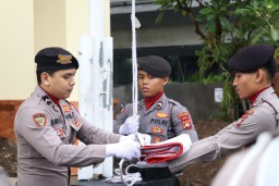 Polres Bandara Ngurah Rai Gelar Upacara Peringatan Hari Olahraga Nasional ke-42