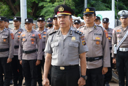 Polres Bandara Ngurah Rai Gelar Upacara Kenaikan Pangkat Pengabdian