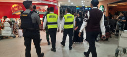 Perkuat Pengamanan Objek Vital Nasional, Polres Bandara Ngurah Rai Gelar Patroli Gabungan di Terminal Internasional