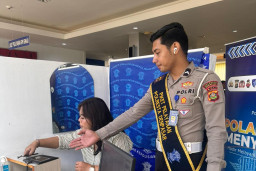 Pelayanan Ramah dan Humanis, Satpas SIM Polresta Denpasar Berikan Pendampingan Kepada Pemohon