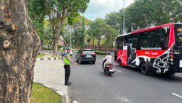 Satlantas Polres Bandara Hadir Jaga Kelancaran Arus Lalu Lintas di Kawasan Bandara I Gusti Ngurah Rai