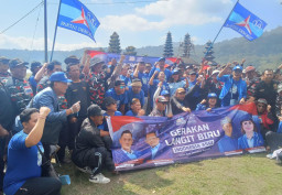 Partai Demokrat Bali Gelar Gerakan Langit Biru Indonesia Asri, Bersihkan Danau Tamblingan dan Tebar Benih Ikan