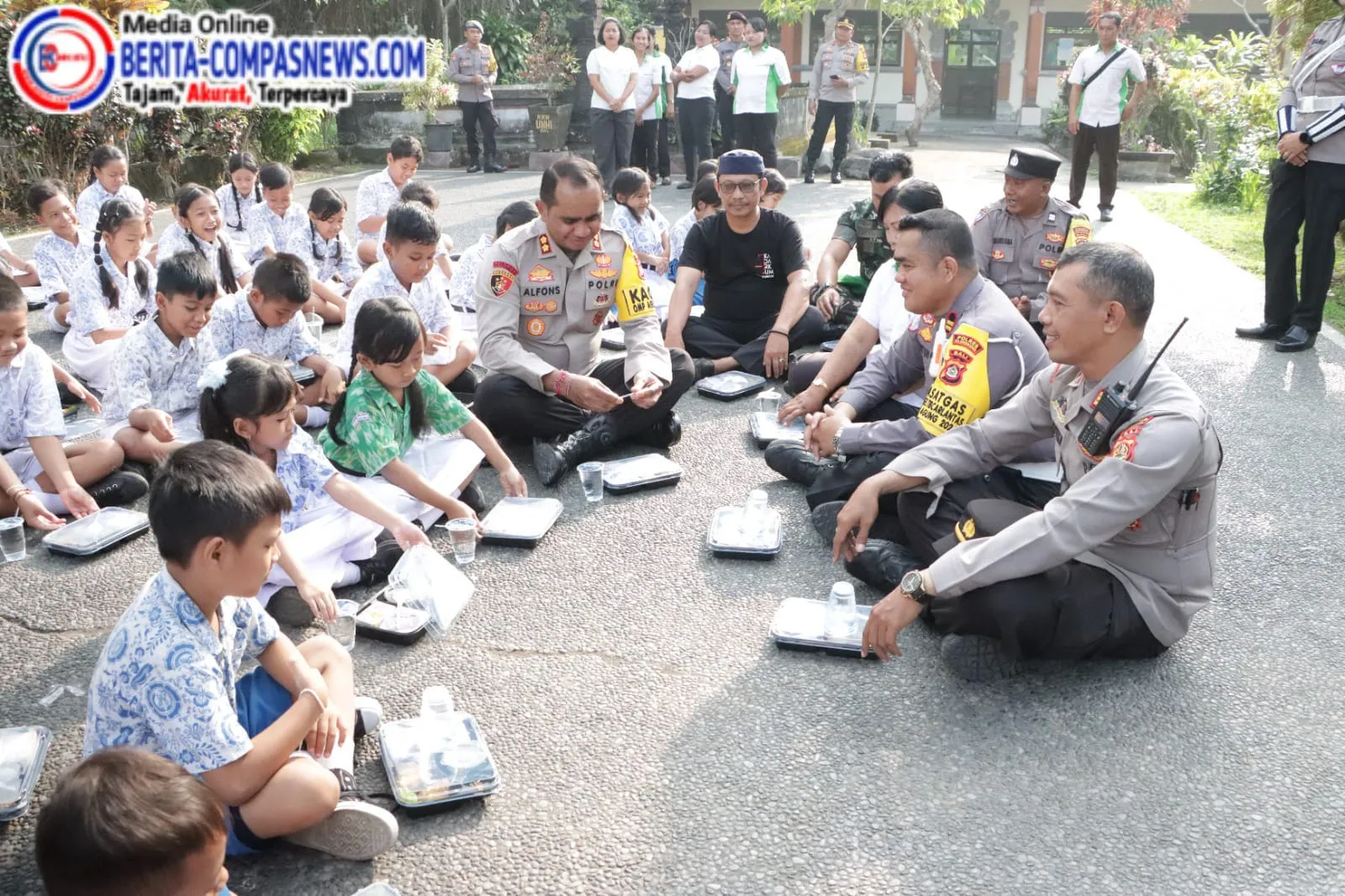 Kapolres Klungkung Bagikan Makan Bergizi Kepada Siswa Siswi di SD Negeri 3 Tihingan