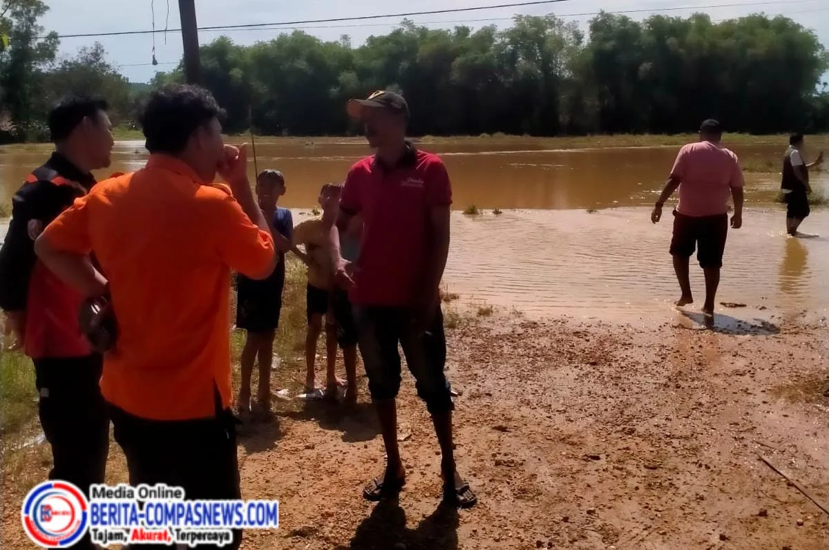 Hujan Intensitas Sedang hingga Tinggi Menyebabkan Banjir di Sampang